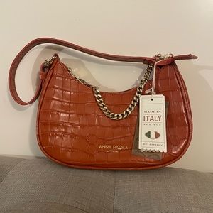 Unique Anna Paola burnt orange purse.